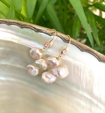 Cargar imagen en el visor de la galería, Elegant earrings composed of Natural Keshi pink and white pearls hanging from gold filled hooks with pink cubic zirconia bezel