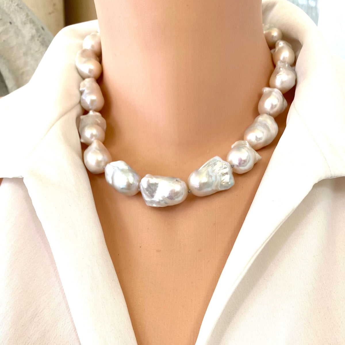 Baroque Pearl Chunky Necklace showcasing handcrafted design with unique white freshwater baroque pearls on a soft grey silk thread.