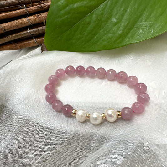 Rose Quartz Pearl Bracelet on white cloth – single bracelet detailed shot