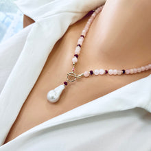 Carica l'immagine nel visualizzatore di Gallery, beautiful gemstones toggle necklace combining Soft pink morganite beads with tiny red Ruby rondelles separated with gold filled beads and finished with baroque pearl pendant. 18"inches long