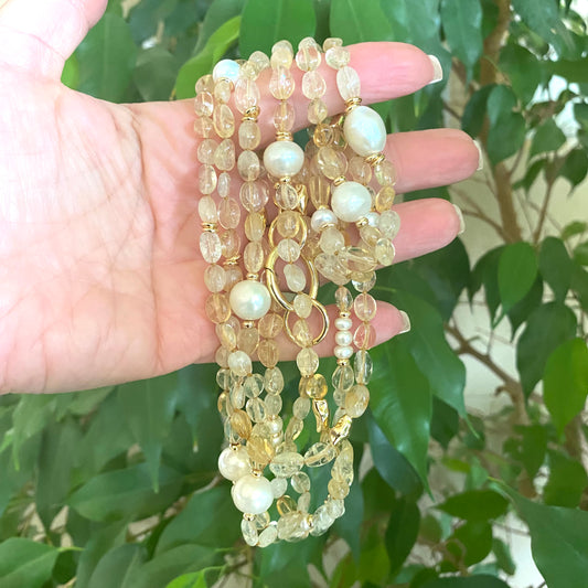 Citrine pearl necklace styled in long layered wrap
