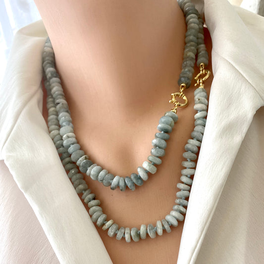Aquamarine beaded necklace worn on mannequin, front close-up