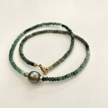 Carica l'immagine nel visualizzatore di Gallery, Stunning shaded green Necklace featuring faceted Emerald roundelle beads and a greenish black Tahitian Pearl centerpiece. May birthstone Gift For Her. Crafted with gold filled, the necklace measures 18.5 inches in length