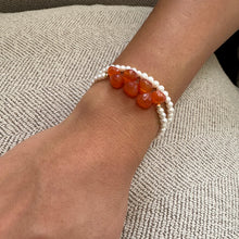 Cargar imagen en el visor de la galería, double wrap bracelet, featuring one long strand of lustrous freshwater pearls 4mm accented by stunning deep orange Carnelian Onion briolettes. Gold filled lobster clasp