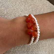 Cargar imagen en el visor de la galería, double wrap bracelet, featuring one long strand of lustrous freshwater pearls 4mm accented by stunning deep orange Carnelian Onion briolettes. Gold filled lobster clasp