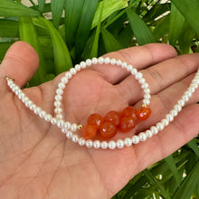 Cargar imagen en el visor de la galería, double wrap bracelet, featuring one long strand of lustrous freshwater pearls 4mm accented by stunning deep orange Carnelian Onion briolettes. Gold filled lobster clasp