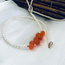 Cargar imagen en el visor de la galería, double wrap bracelet, featuring one long strand of lustrous freshwater pearls 4mm accented by stunning deep orange Carnelian Onion briolettes. Gold filled lobster clasp