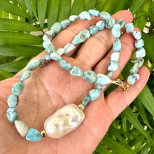 Cargar imagen en el visor de la galería, Fall in love with the soothing blues of Larimar and the timeless elegance of baroque pearls! This necklace features dreamy, ocean-inspired Larimar gemstones nuggets, perfectly complemented by the organic beauty of a stunning baroque pearl, 18 inches