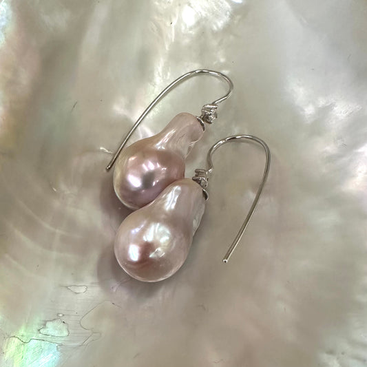 Lavender Baroque Pearl Earrings – silver design displayed on white pearl shell