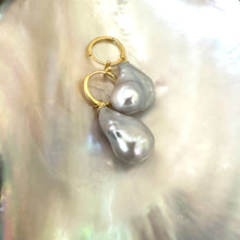 Carica l'immagine nel visualizzatore di Gallery, Grey baroque pearl hoop earrings resting on pearl shell backdrop, gold vermeil hoops handmade in Canada.