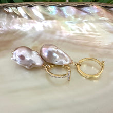 Charger l'image dans la galerie, Pink baroque pearl hoop earrings resting on white pearl shell, designed and handmade in Canada.