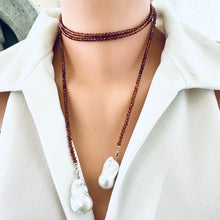 Carica l'immagine nel visualizzatore di Gallery, Hessonite Garnet and Baroque Pearl Lariat Necklace worn choker style on mannequin in white blouse, designed and handmade in Canada.