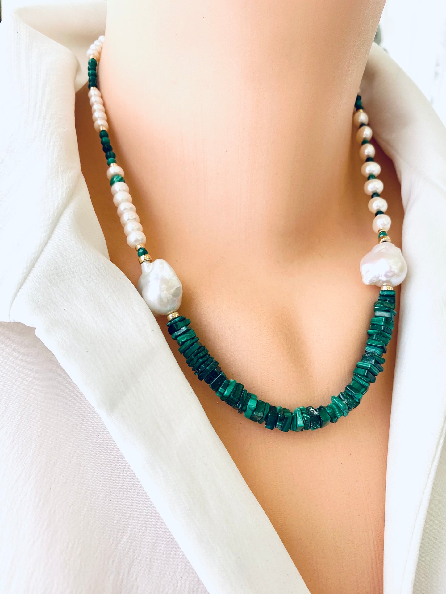 Malachite baroque pearl necklace in 14K gold filled featuring asymmetric design and rich green tones.