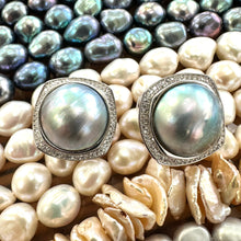 Carica l'immagine nel visualizzatore di Gallery, Mabe Pearl Earrings – displayed against colorful gemstone backdrop