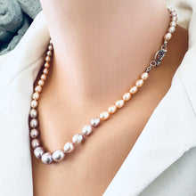 Carica l'immagine nel visualizzatore di Gallery, Pastel Rice Pearl Necklace featuring sterling silver tulip clasp shown in close-up on mannequin.