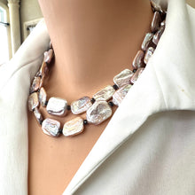Load image into Gallery viewer, Side view of Statement Pearl Necklace with purple pink rectangular pearls and navy iolite gemstones on mannequin.