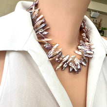 Load image into Gallery viewer, Biwa Pearl Necklace displaying lustrous multicolor stick pearls worn by mannequin side angle.