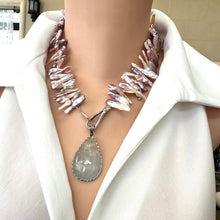 Load image into Gallery viewer, Biwa Pearl Necklace with added pendant attachment shown in side view on mannequin.