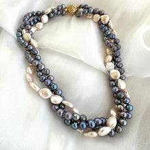 Load image into Gallery viewer, Black and White Pearl Necklace featuring twisted multi-strand freshwater pearls on white background.