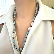 Lade das Bild in den Galerie-Viewer, Side angle of larimar ruby and baroque pearl necklace highlighting color contrast