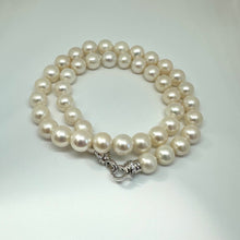 Charger l'image dans la galerie, White pearl necklace cross pendant photographed on white backdrop — handcrafted classic pearl jewelry by Loulia Pearl Jewelry