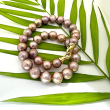 Charger l'image dans la galerie, Metallic Edison Pearl Necklace | 12–14mm, 18" handcrafted design with large pearls and gold clasp on tropical leaves.