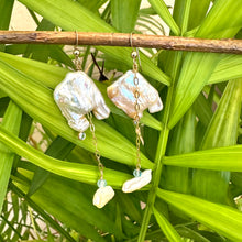 Lade das Bild in den Galerie-Viewer, Boho pearl earrings gold filled displayed outdoors with leafy green backdrop — keshi square pearls and blue gemstones by Loulia Pearl Jewelry