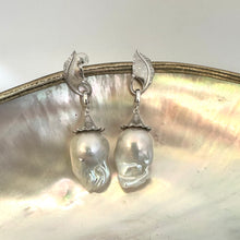 Lade das Bild in den Galerie-Viewer, Detailed view of Leaf Design Baroque Pearl Earrings on white surface — polished sterling silver leaves and removable baroque pearls by Loulia Pearl Jewelry