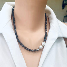 Cargar imagen en el visor de la galería, Navy Blue Iolite Rectangular Beads and 2 Baroque Pearls off centre Necklace. Finished with sterling silver details, this necklace brings together luxury and durability. The adjustable length, ranging from 19 to 20 inches, ensures a perfect fit
