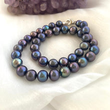 Load image into Gallery viewer, Black baroque pearl necklace with rhodium-plated clasp on white background