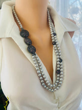 Carica l'immagine nel visualizzatore di Gallery, Elegant double-strand Grey Pearl Necklace with gunmetal CZ accents displayed on mannequin side angle.