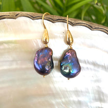 Carica l'immagine nel visualizzatore di Gallery, Baroque pearl drop earrings in black peacock hues with gold vermeil hooks on white pearl background