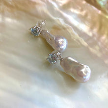 Cargar imagen en el visor de la galería, Baroque pearl drop earrings with blue topaz studs on white shell backdrop