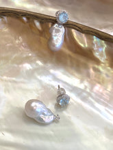 Cargar imagen en el visor de la galería, Convertible blue topaz pearl drop earrings with removable studs on shell background
