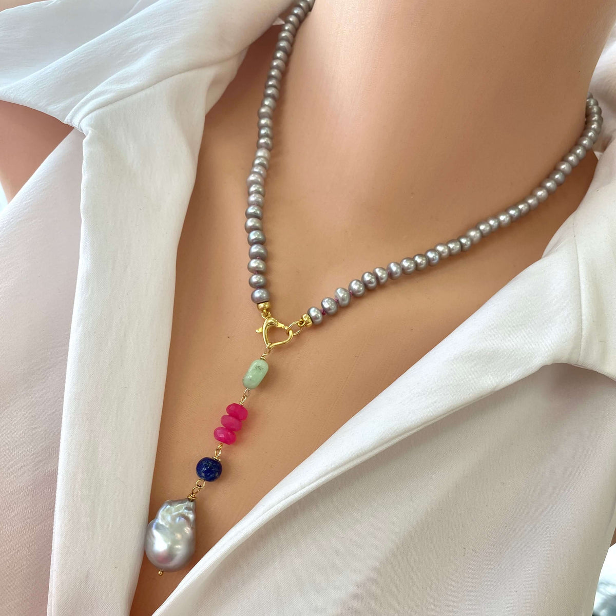 Grey pearl necklace with removable pendant styled as elegant everyday pearl jewelry