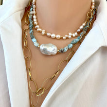 Cargar imagen en el visor de la galería, Fall in love with the soothing blues of Larimar and the timeless elegance of baroque pearls! This necklace features dreamy, ocean-inspired Larimar gemstones nuggets, perfectly complemented by the organic beauty of a stunning baroque pearl, 18 inches