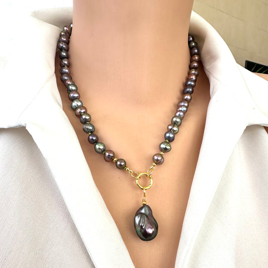 Black pearl pendant necklace with removable baroque charm displayed on mannequin front view