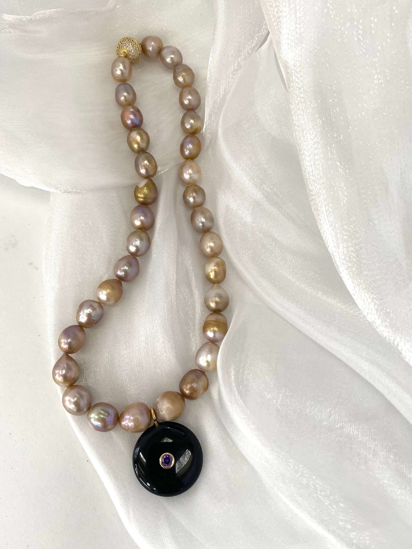 golden 10m rice pearl choker choker necklace on white sheet