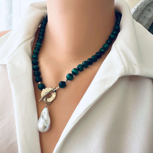 Malachite toggle necklace with baroque pearl pendant, showcasing artisan craftsmanship and vibrant green gemstones.