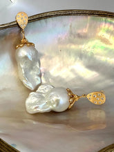 Cargar imagen en el visor de la galería, Close-up of Baroque Pearl Gold Vermeil Earrings on white pearl backdrop — handcrafted statement jewelry by Loulia Pearl Jewelry