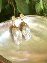 Cargar imagen en el visor de la galería, Baroque Pearl Gold Vermeil Earrings photographed with green leaves — gold vermeil and baroque pearls handcrafted by Loulia Pearl Jewelry