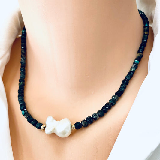 Black turquoise baroque pearl necklace worn on model featuring natural freshwater pearl centerpiece