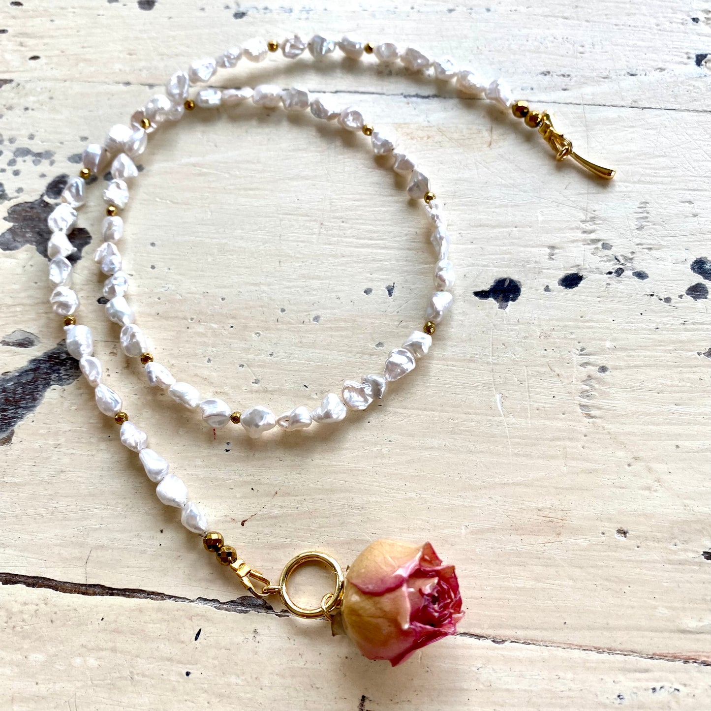 Real pink rosebud pearl necklace handmade in Canada with natural pearls and floral pendant
