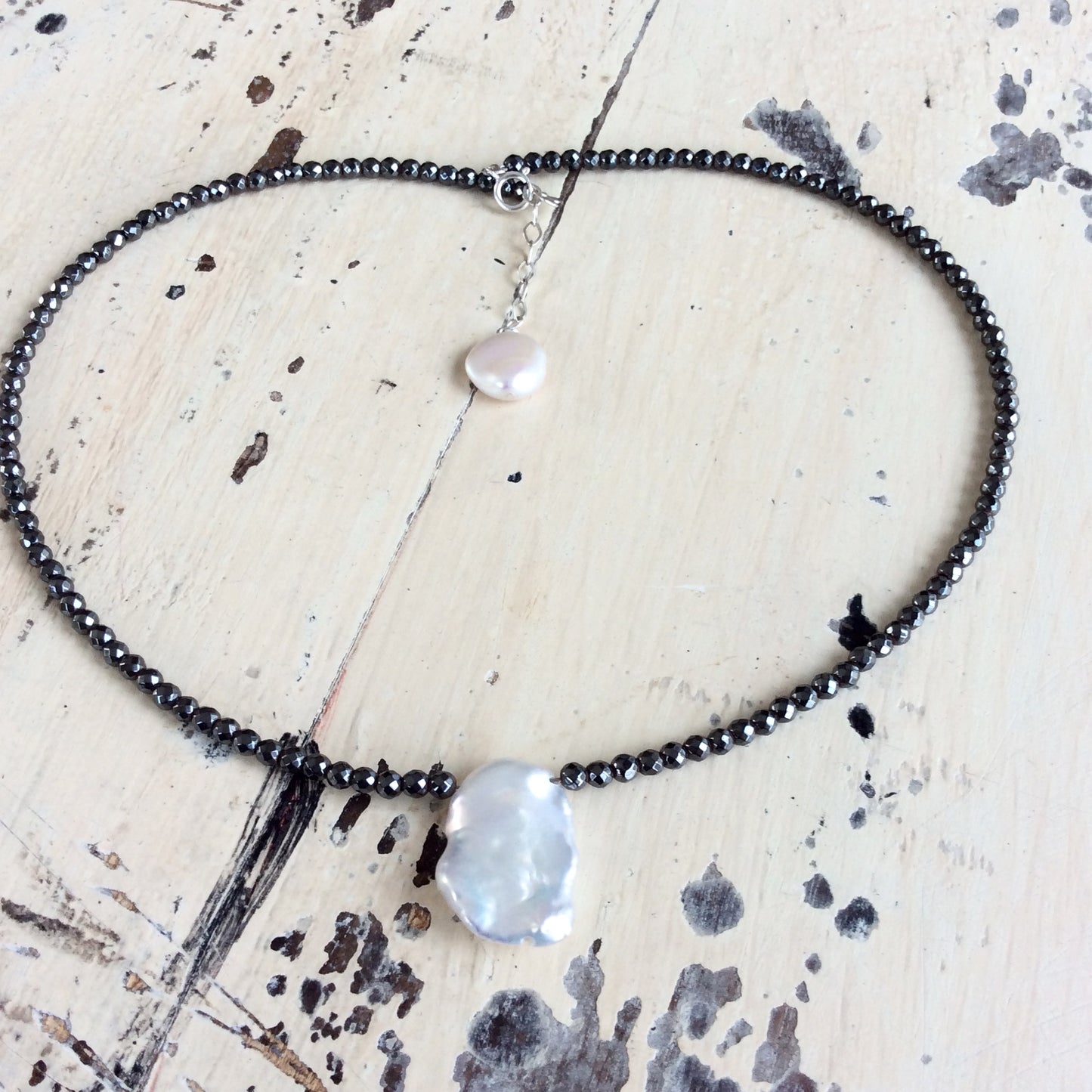 Hematite baroque pearl short necklace showing sterling silver clasp and extension chain