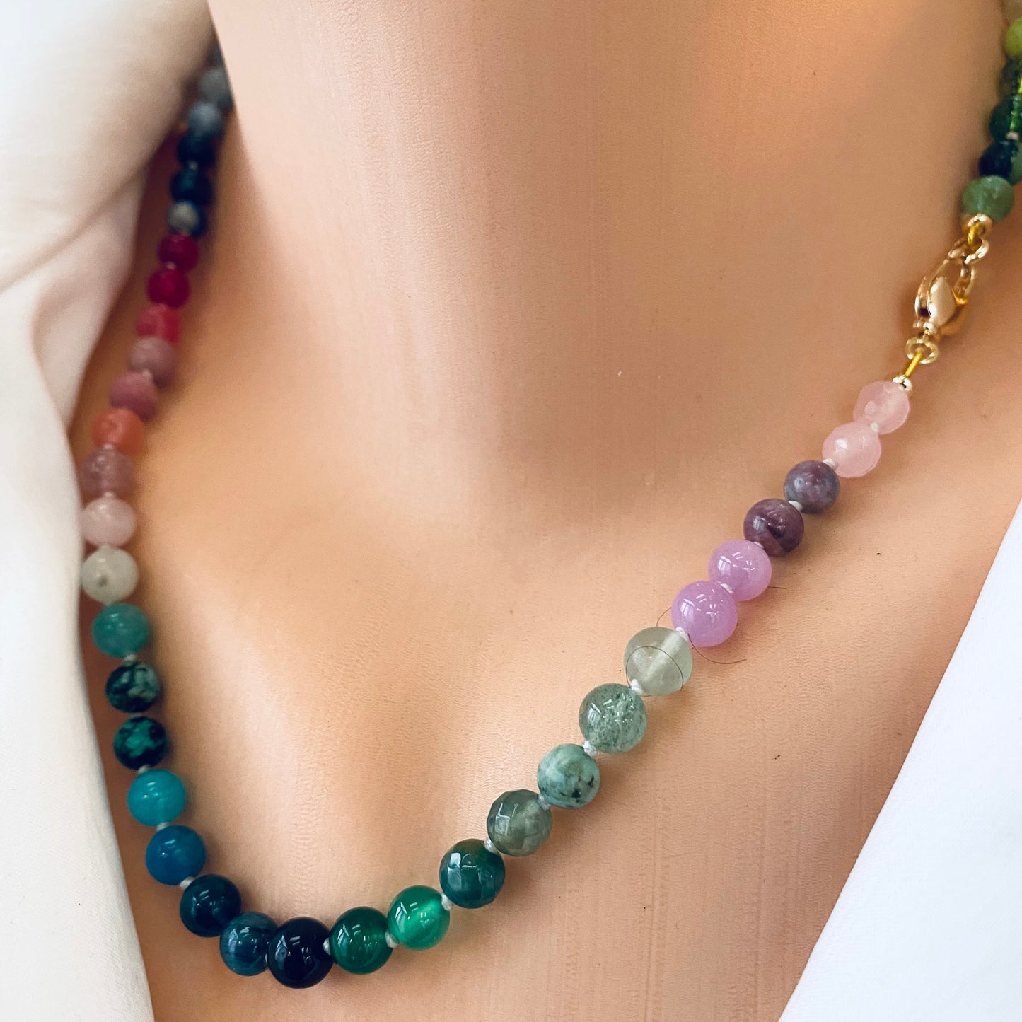Rainbow candy necklace made with mini gemstone beads in vibrant colors, celebrating individuality and style.