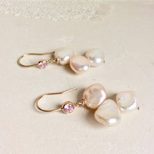Cargar imagen en el visor de la galería, Elegant earrings composed of Natural Keshi pink and white pearls hanging from gold filled hooks with pink cubic zirconia bezel