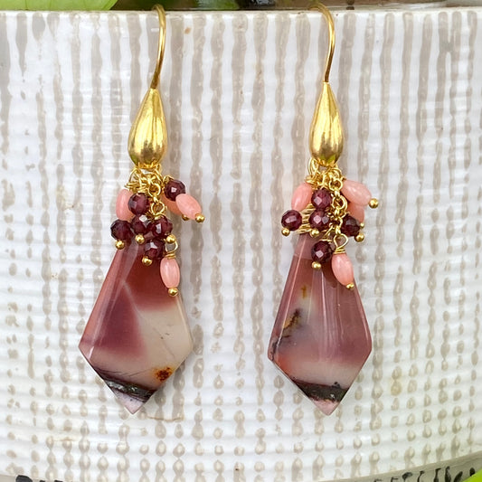 Jasper cluster earrings featuring Mookaite, garnet, and pink coral with gold accents and unique patterns.