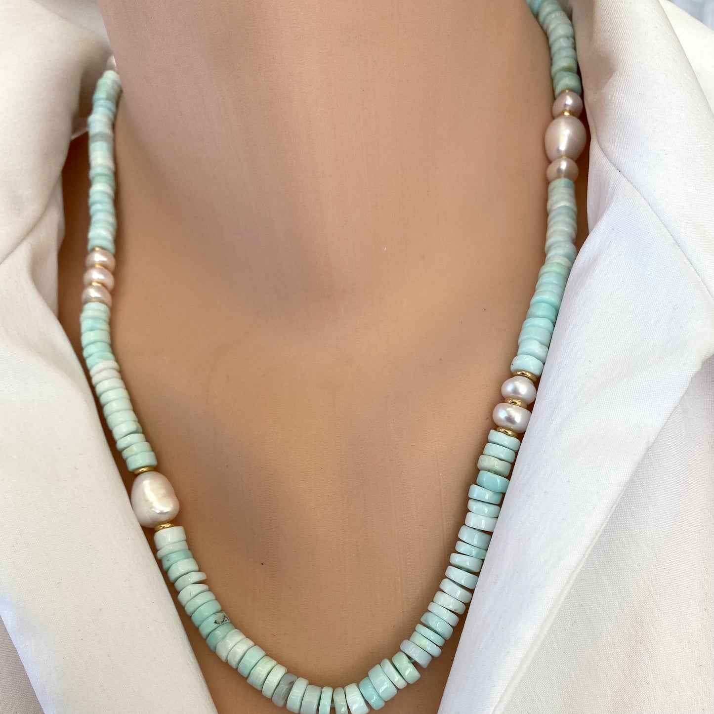 Sky blue opal pearl necklace worn on neckline with candy-inspired gemstone design, handmade Canadian jewelry