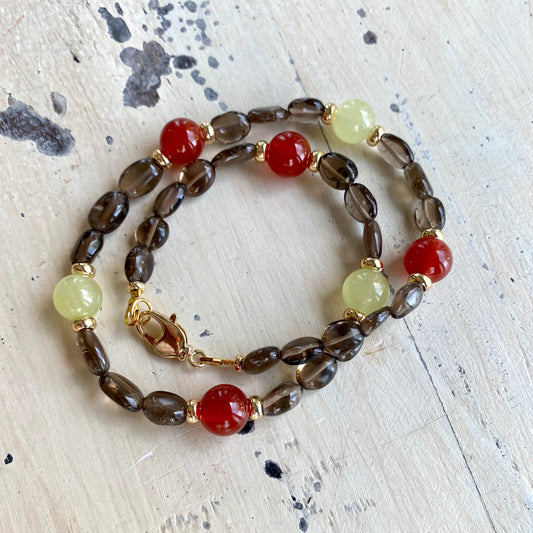 Smoky quartz bonbons choker necklace laid flat with smoky quartz, jade, and carnelian beads, handmade Canadian jewelry