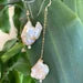 Mismatched Pearl Drop Earrings – Clear CZ, 14k Gold Filled, showcasing modern elegance with unique asymmetrical design.